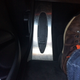 Aluminum dead pedal with an M logo. The actual pedals were just black rubber.